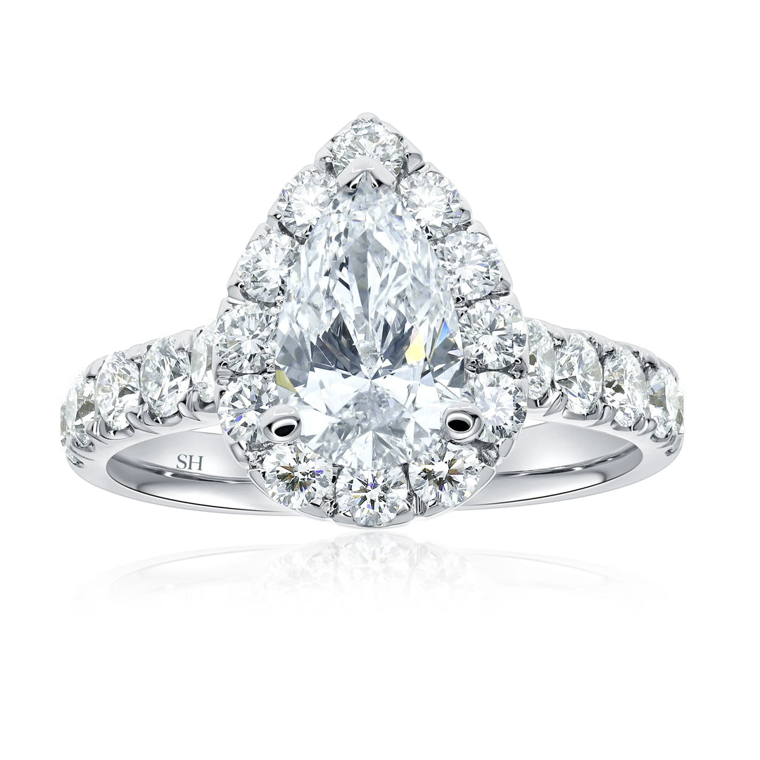 Bold Pear Shaped Halo & Pavé-Set Diamond Band - W0578