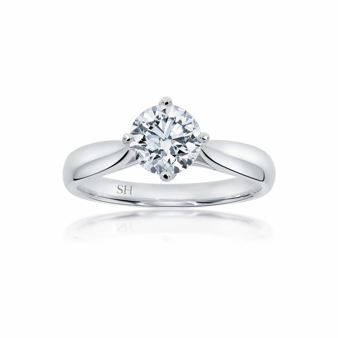 Brilliant solitaire with offset 4-claw design - W0400