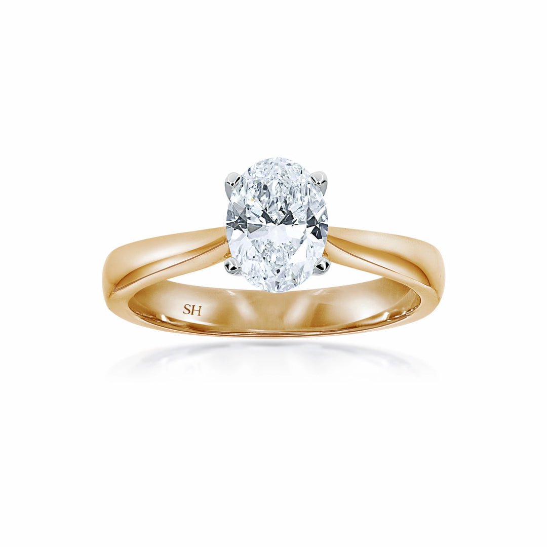 Minimalistic 4-claw Oval solitaire with tapered band - W0408