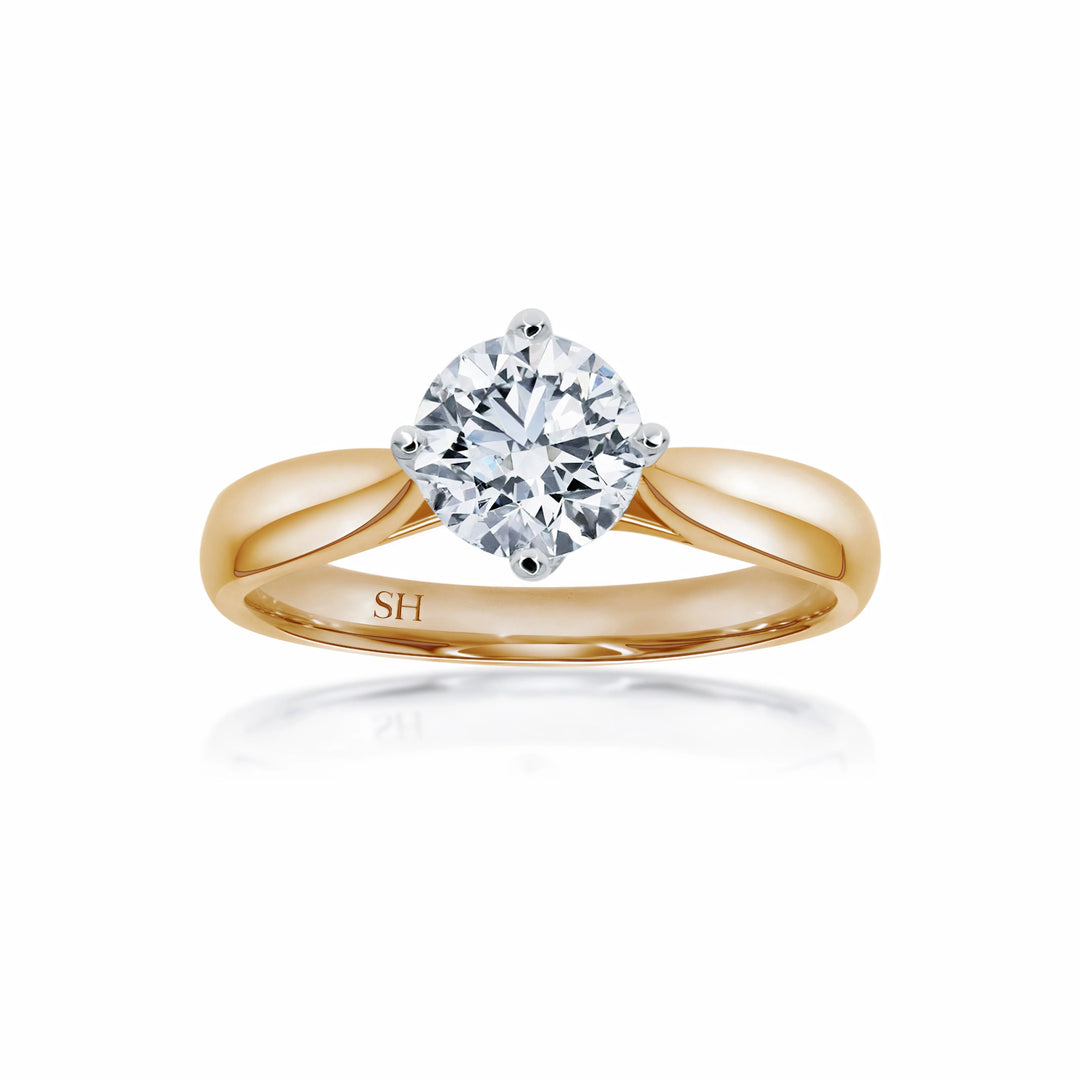 Brilliant solitaire with offset 4-claw design - W0400