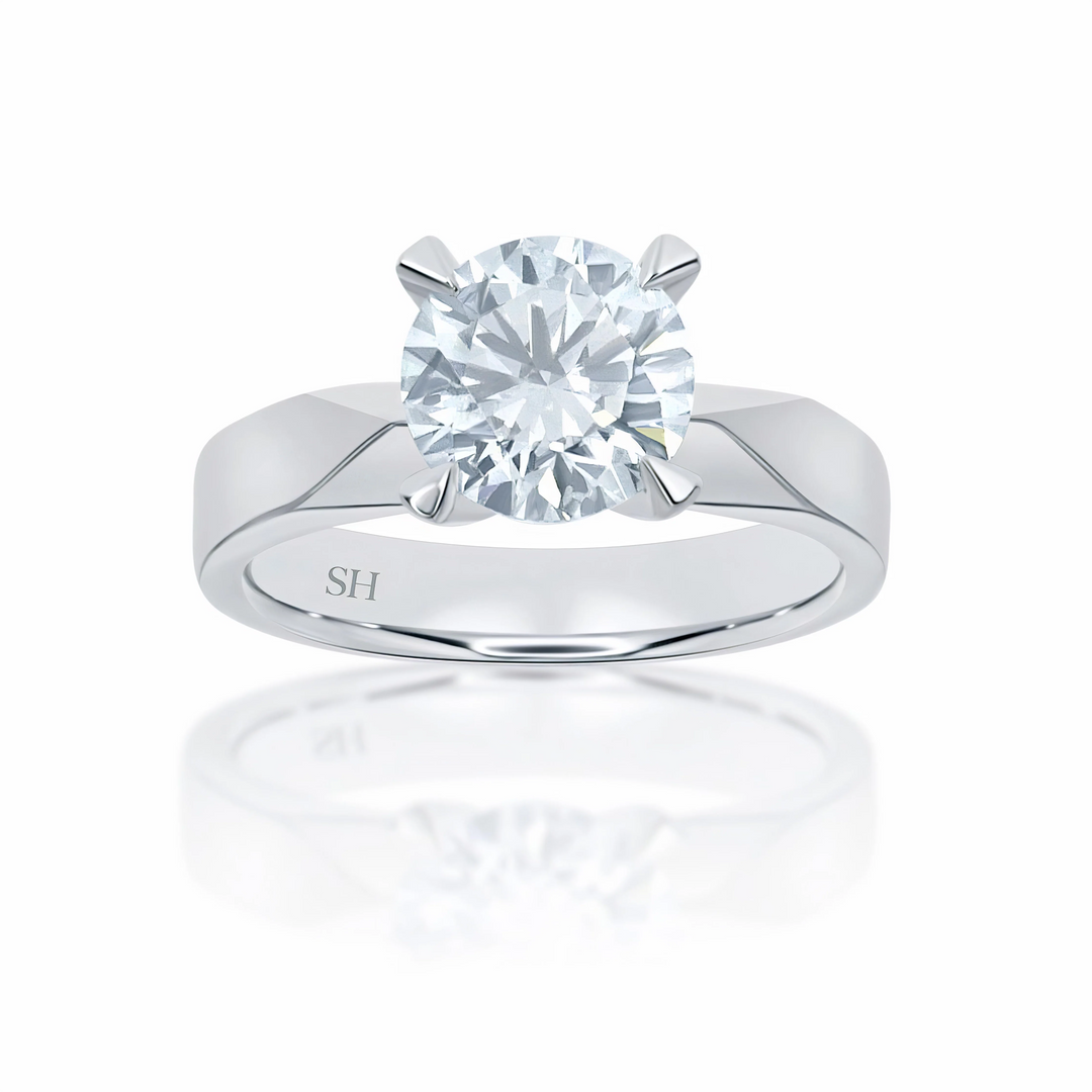 Classic solitaire engagement ring with high 4-Claw setting - W0011