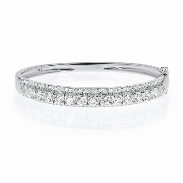 18kt gold 3-row diamond bangle with raised centre tier - W0739