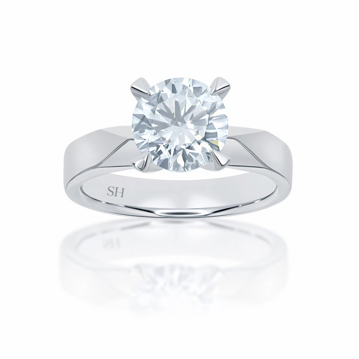 Classic solitaire engagement ring with high 4-Claw setting - W0011