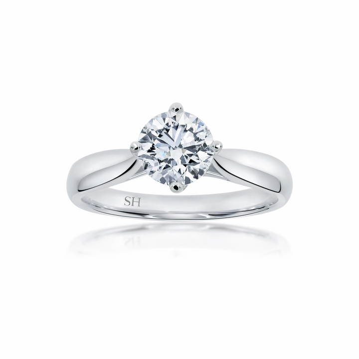 Brilliant solitaire with offset 4-claw design - W0400
