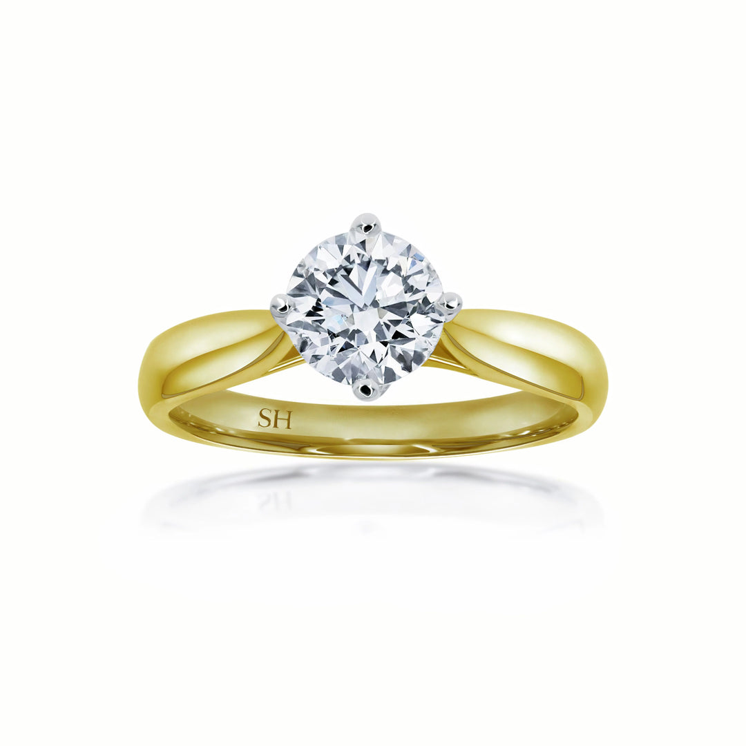 Brilliant solitaire with offset 4-claw design - W0400