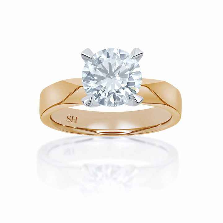 Classic solitaire engagement ring with high 4-Claw setting - W0011