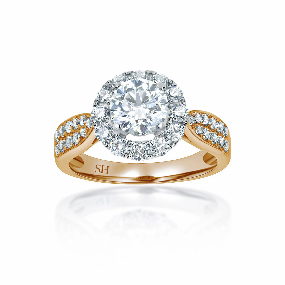 Halo style engagement ring with tapered pavé set diamond band - W0040