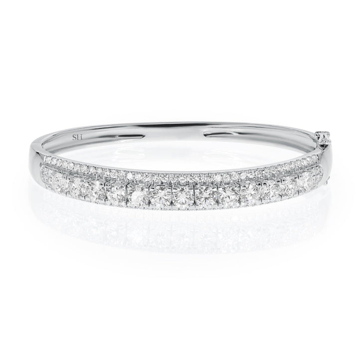 18kt gold 3-row diamond bangle with raised centre tier - W0739
